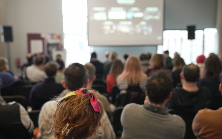 Audience watching a presentation