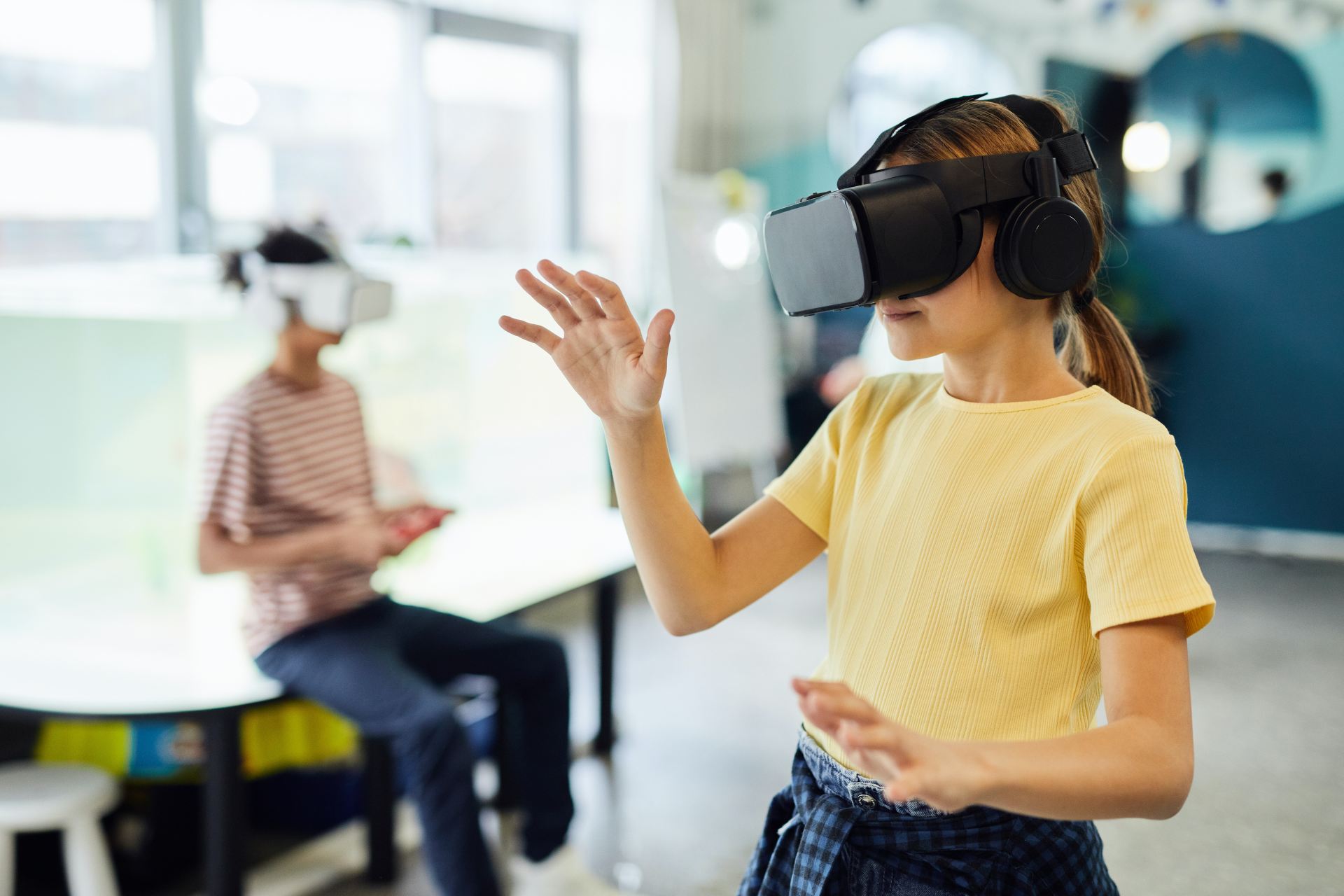 Children using VR headsets