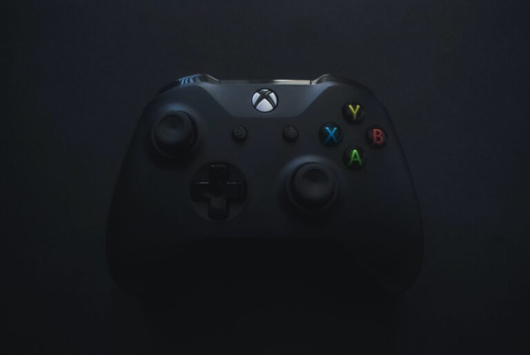 A Xbox controller in a darkened room