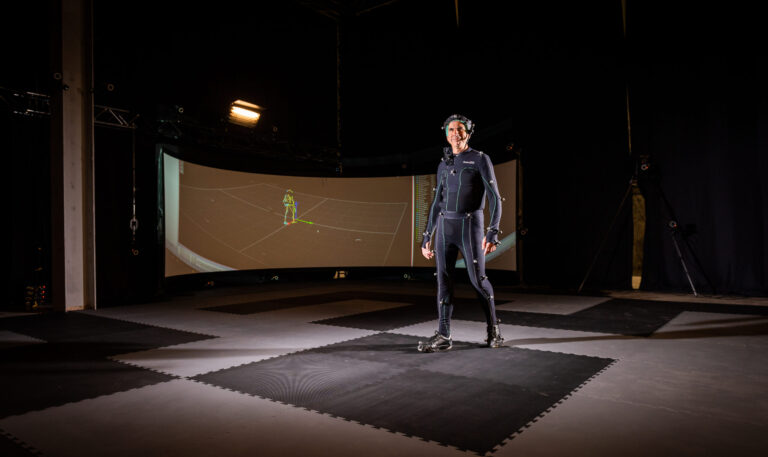 An image of a man stood in CAMERA's motion capture stage.